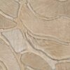 Close-up of Bloom 01482, a luxury designer rug with handmade stitched hide patchwork.