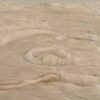 Close-up of Bloom 01482 high end handmade hide designer rug with tan fur texture.