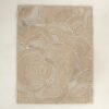 Bloom 01482 designer rug with abstract beige shapes on luxury wool background.