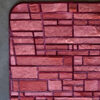 Luxury custom designer rug Tower House 02877 with pink patchwork on gray floor.