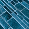 Close-up of high end designer rug, showing handmade wool and hide textures in blue.