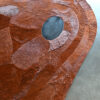 Luxury handmade designer rug with brown hide-like details and a gray wool center.