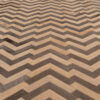 Close-up of a luxury designer rug's chevron in high-quality handmade wool.