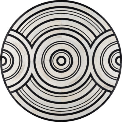 Concentric black rings on white create a luxury designer handmade wool rug pattern.