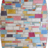 Luxury designer rug with a geometric mosaic pattern in vibrant, multicolor tones.
