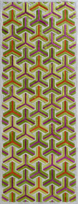 Luxury designer rug with geometric chevron pattern in vibrant hues on light ground.