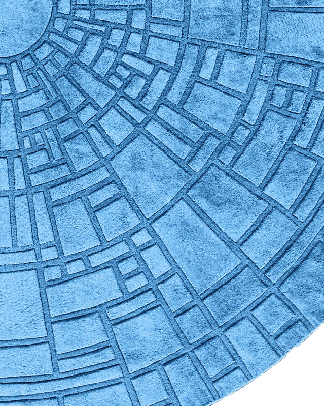 Luxury designer round blue wool rug with geometric embossed rectangle pattern.