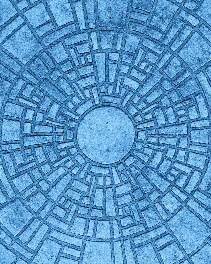 Luxury designer rug with abstract blue concentric circles and intersecting lines.