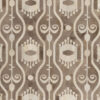 Luxury custom designer rug with tan, beige, and brown geometric abstract motif.