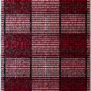 A luxury designer rug featuring a plaid mosaic of red, pink, and black squares.