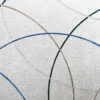 Silhouette 02983 luxury designer rug with curved blue, brown, black, and gray lines on a light background.