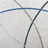 Silhouette 02983 luxury designer rug with light gray texture and curved blue, brown, and green lines.