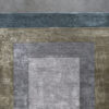 Atlas 03147 luxury designer rug with blue, beige, and gray borders on a high-end wool background.