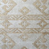 Luxury designer rug in beige and off-white with geometric diamonds and zigzag patterns.