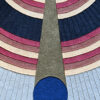Atlas 03269 luxury designer rug displays abstract geometric arcs and a tan triangle over premium hues.
