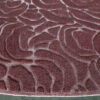 Close-up of Bloom 03996 luxury designer rug, round with raised mauve and pink abstract pattern.