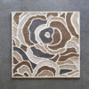 The Bloom 03448 designer rug showcases an abstract rose pattern in luxury high-end wool on gray.