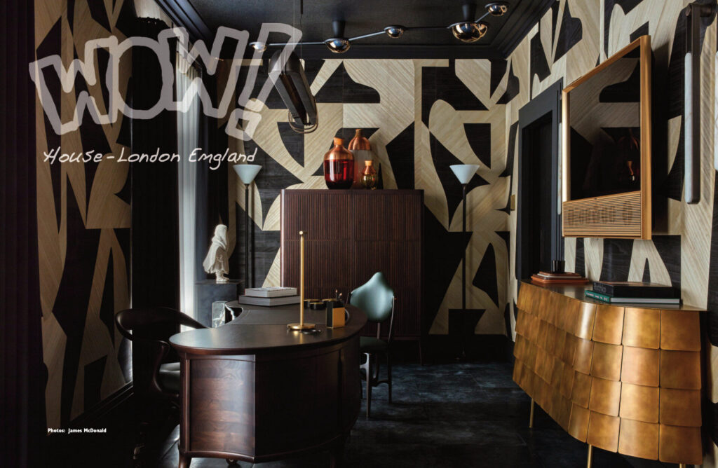 Contemporary office with geometric walls, luxury custom designer rug, dark furniture, and gold D24 cabinet in a stylish London home.