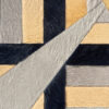 Atlas 21081 luxury designer rug with geometric beige, black, and gray handmade hide pieces.