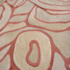 Close-up of a luxury designer rug with cream and pink abstract pattern, handmade wool, Bloom 03697.