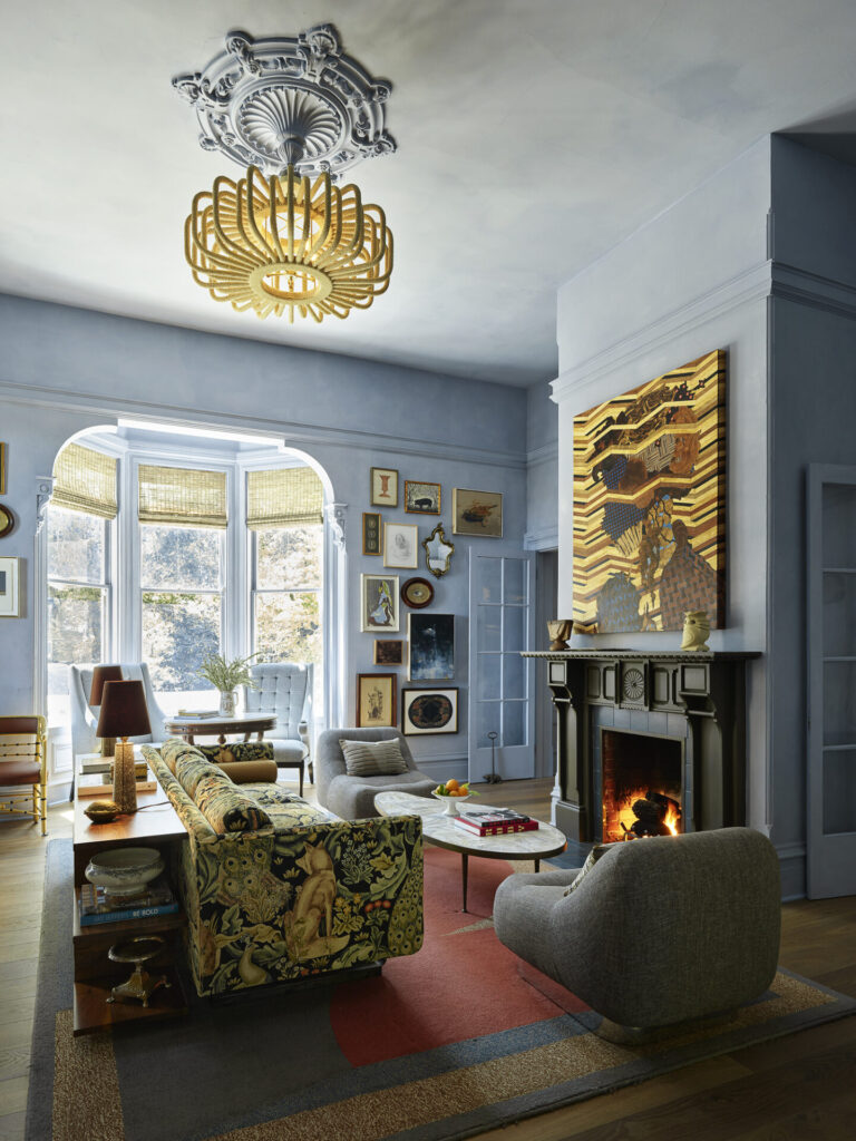 A stylish living room with luxury designer rugs, custom wool sofa, modern decor, and natural light.