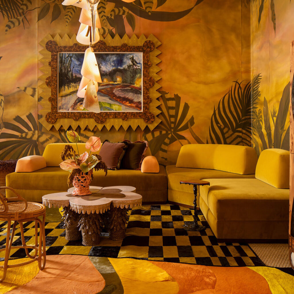 A living room features yellow Moniomi sofas and a high end designer checkered rug.