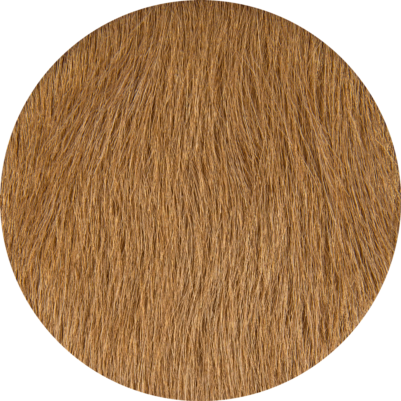Close-up of light brown wavy fur texture used in luxury handmade designer hide rugs.