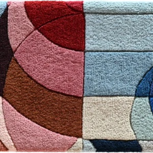 Luxury designer rug featuring abstract curves in red, blue, beige; high-end handmade wool artistry.