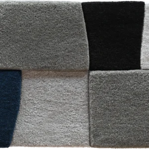 Luxury designer rug tile with textured grey, black, and blue geometric fabric pattern.
