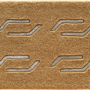 Luxury designer doormat rug featuring four geometric patterns, ideal for high end interiors.