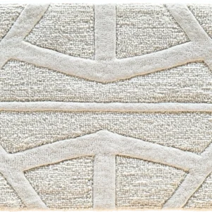 Luxury designer rug in textured beige with raised geometric pattern, high-end handmade wool.
