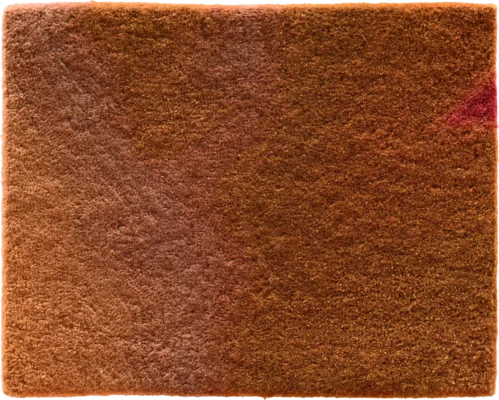 A brown designer rug swatch with subtle texture and a small reddish stain, ideal for high end custom rugs.