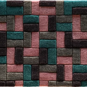 Luxury designer rug featuring a geometric pattern of interlocking rectangles in teal, pink, gray, and black.