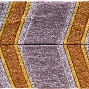 Luxury designer rug sample with gold and brown geometric zigzags on purple wool fabric.