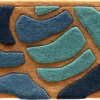 Luxury designer rug featuring a tan base and abstract blue and teal shapes, high-end custom wool.