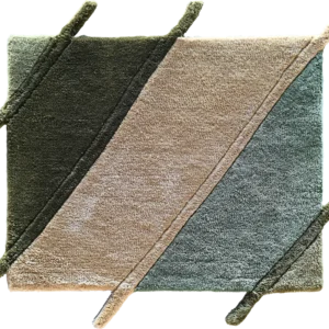 Luxury designer rug with dark green, beige, and light green diagonal blocks and raised lines.