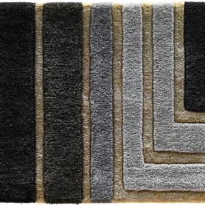 Luxury designer rug tile with geometric layered pattern in black, gray, and beige.