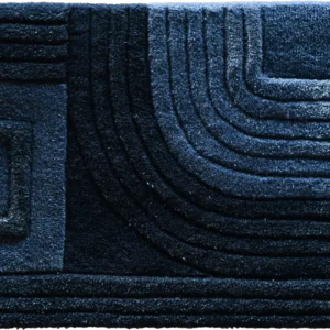 Luxury designer rug featuring textured blue and black geometric patterns, high-end craftsmanship.