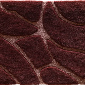 Close-up of a luxury designer rug in dark red and brown with an abstract, organic pattern.