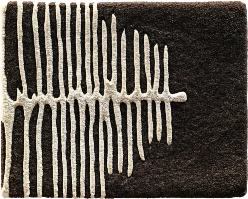 A dark brown luxury designer rug with a light abstract fishbone pattern on high-end wool.
