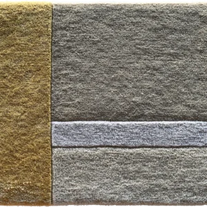 Luxury designer rug featuring a textured square pattern with gold, light, and dark gray accents.