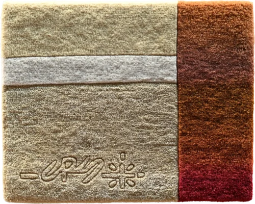 A high-end designer rug with textured beige, white, and red-brown panels and an embossed logo.