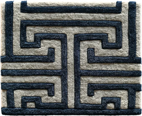 Luxury designer rug featuring a geometric dark blue pattern on a beige high-end wool background.