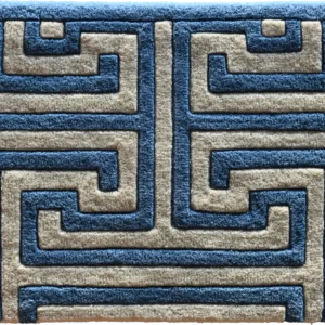 Luxury designer rug with raised blue and beige geometric maze pattern, high-end and custom-made.