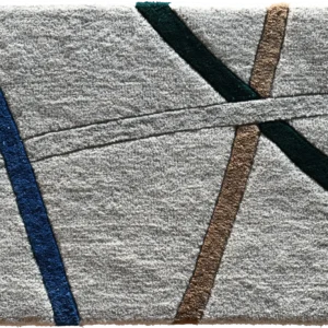 Luxury designer rug with gray textured surface and intersecting blue, green, and brown lines.