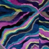 Close-up of Submerge Hide 14897 luxury designer rug with wavy, colorful stripes and textured, high-end handmade hide craftsmanship.