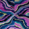 This luxury designer rug features layered, wavy bands in blue, purple, pink, green, and black in a symmetrical handmade hide design.