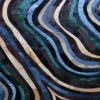 Wavy, overlapping lines in blue, green, brown, and beige create a tranquil luxury designer rug pattern for high end interiors.