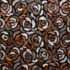 Abstract rose motifs in brown, bronze, and silver on luxury designer hide rug leather.