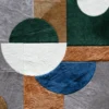 Forms Hide 29800 showcases a luxury designer rug with geometric patchwork in rich hues, featuring handmade hide and wool textures.